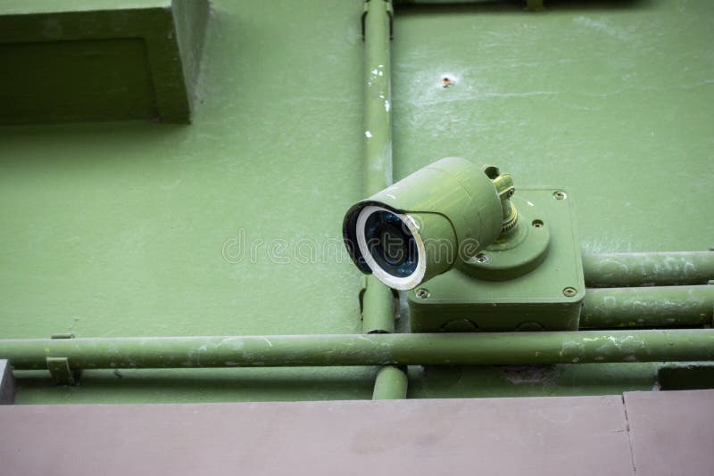 https://thumbs.dreamstime.com/b/cctv-security-camera-against-building-all-green-color-115354179.jpg
